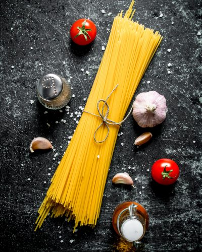raw-spaghetti-with-garlic-cloves-and-tomato-2021-04-06-01-23-09-utc (1)