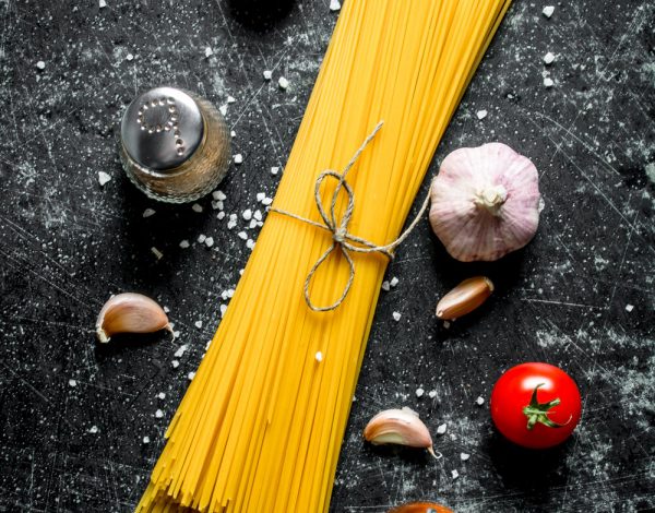 raw-spaghetti-with-garlic-cloves-and-tomato-2021-04-06-01-23-09-utc (1)